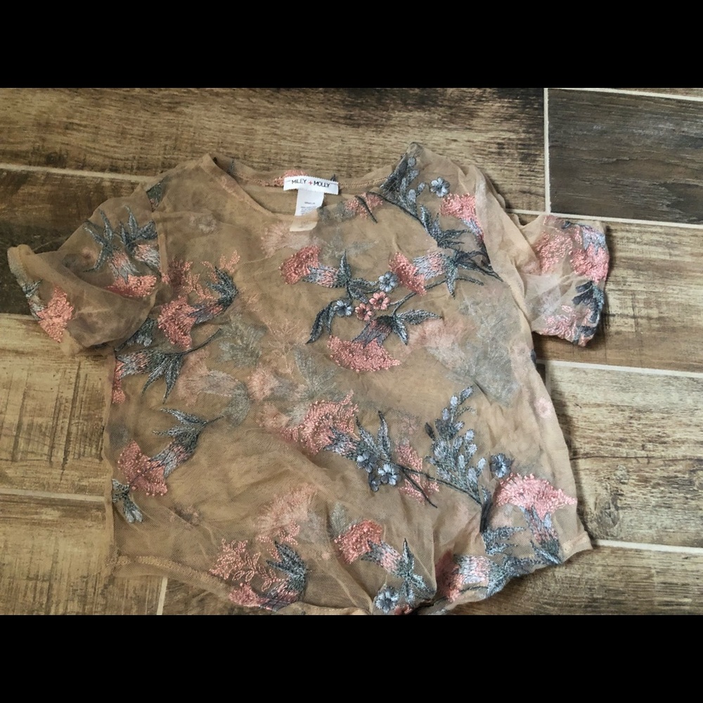 Miley + Molly overlay with floral detailing.